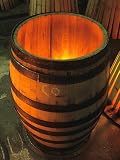 Toasting a New Oak Wine Barrel at the Demptos Cooperage, Napa Valley, California, USA Photographic Poster Print by John Alves, 42x56