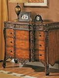 Three Drawer Carved Leaf Bombe Chest By Coaster Furniture