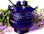 Cobalt Blue Lovebirds Atop Jar
