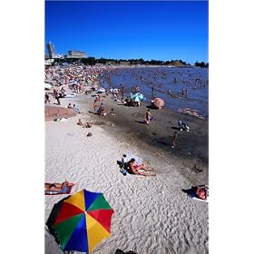 photographie Sunbathers and swimmers on Ramirez beach. est disperible en (L x H): 40 x 60 cm de M...