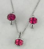 18k White Gold Earring and Pendant set Made in Italy TTW 1.0 K G/V.V.S. Diamonds and 7.59k Rubilite