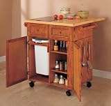 Medium Oak Kitchen Butler&reg; with Black Granite Cutting Board By Powell Furniture