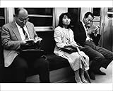 IMAGE OF Photographic Prints of Three passengers on the Tokyo underground from Mary Evans