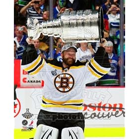  Tim Thomas - holding the 2011 Stanley Cup Trophy - NHL 8x10 Photo (Boston Bruins)