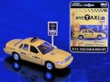 New York City Die-Cast Taxi and Sign
