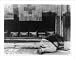 Historic Print (L): [Russian man collapsed from typhus under window with Red Cross banner, at building where
