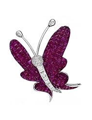 18K White Gold 26.04 CTW Ruby and 0.5 CTW Color G VS2 Diamond Ladies Brooch. Length 43 mm. Total Item weight 19.1 g.