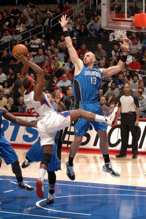 Orlando Magic v Los Angeles Clippers: Marcin Gortat and Baron Davis Photographic Poster Print by Noah Graham, 8x12