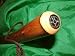 Elegantly finished, flamed and lacquered wood hiking pole/stick with functional compass* in handle, nylon wrist loop and Spiked Metal Ferrule. *it must be stressed that although the compass in this pole is fully functional, additional PRIMARY navigational aids must be carried at all times when hiking/walking (GPS/Dedicated Compass) Trekking / hiking poles / hiking sticks or walking poles are a common hiking accessory. They have features such as spike at the bottom and  wrist straps. Spiked tips to aid walking and stability under normal conditions and rough terrain.  Descendants of the common walking stick, trekking poles are usually used by hikers for the same reasons - to provide some rhythm to their walking pace and for added support. On flat, smooth terrain they really aren't necessary although using them can increase the exercise a hiker gets from the trip, as well as the speed. But on less certain terrain, or steep slopes, they provide useful lateral stability, and many turn to them for help with knee pain. They can also be used as aids when climbing rocks or boulders, to probe the depth of mud or water and facilitate a crossing. When traversing steep slopes for long distances,