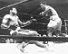 Joe Frazier "Ali / Frazier I: Fight of the Century Knockdown I" 16" x 20" Unframed Black & White Ph