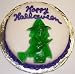 Gourmet Food : Chocolate Chip Decorated Cake Single Layer 8" Round Topped with Gummie Witch Purple Trim