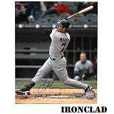 Joe Mauer Autographed 8x10 Vertical Swinging from 3rd Base Side w/ 