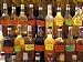 Bottles of Local Rum Drinks at Le Diamant Village, Martinique, West Indies, Caribbean Art Photographic Poster Print by Guy Thouvenin, 16x12