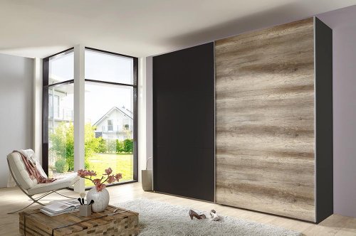 2-trg. Schwebetürenschrank in Lava/grau mit 1 Tür in Wildeiche-Nachbildung, 3 Einlegeböden und 3 Kleiderstangen, Maße: B/H/T ca. 270/236/65 cm