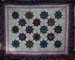 Mardi Gras Stack + Whack bed quilt