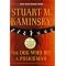 Cuddle up with a Stuart M. Kaminsky thriller/mystery book....