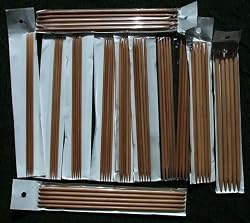 8 inches (20.3cm) in length, One set of 12 size double pointed bamboo knitting needles US 0-10.5. total 60 needles