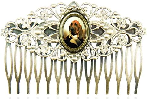 Filigree hair comb with with oval glass cabochons protecting a design with a dog dressed up an army general