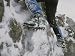 A Climber Kicks for Purchase on a Rime-Covered Rock Photographic Poster Print, 24x18