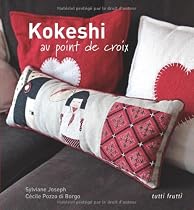 Kokeshi au point de croix