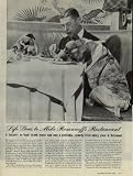 LIFE goes to Mike Romanoff's Restaurant: A fantastic ex-fraud
turned honest man runs a profitable, celebrity-filled eating place
in Hollywood. Celebrities pictured at Romanoff's include George
Sanders, Sir Cedric Hardwicke, Van Johnson, Gretchen Donahue, Elsa
Maxwell, Darryl Zanuck, Monty Woolley, Lauritz Melchior, Esme
O'brien Sarnoff, Gregory Peck, Jeanette MacDonald, Fay Wray, Donald
Nelson and Constance Bennett. ..... 1945 LIFE Magazine Article,
A5009A.