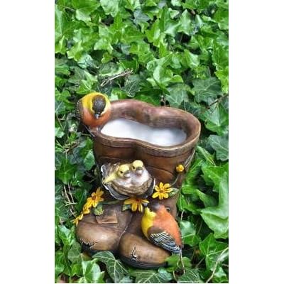 Brown welly boot with bird planters