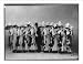 Historic Print (L): [Line of 8 chorus girls with top-hatted man in middle]