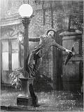 Gene Kelly singing in the Rain by Liby. Size 23.60 inches width by 31.50 inches height. High Quality Art Poster Print