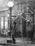 Gene Kelly singing in the Rain by Liby. Size 23.60 inches width by 31.50 inches height. High Quality Art Poster Print