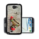 Liili Premium Samsung Galaxy Note 2 Aluminum Backplate Bumper Snap Case ID: 26036548 Traditional Turkish a Pair of Clog With Atractive Style and Colorful on a wooden table