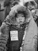 Child Bundled in Fur and Tagged with Name Written in Japanese Characters and Roman St...