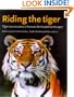 Riding the Tiger: Tiger Conservation in Human-Dominated Landscapes