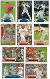 2012 Topps Baseball Series #1 Complete Mint Hand Collated 330 Card Set (Cards #1 Through #330). Loaded with Stars Including Mickey Mantle, Derek Jeter, Albert Pujols, St Louis Cardinals World Series Highlights Cards and More. This Is Series #1 ONLY, Series #2 Won't Be Released Until May, Factory Sets Won't Be Released Until July.
