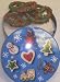 Scott's Cakes 1 lb. White Chocolate Covered Pretzel with Christmas Jimmies in a Christmas Cookie Tin