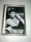 Collectible Memorabilia -- Autographed Picture of Raquel Welch in 5 x 7 stand-up frame -- AS SHOWN
