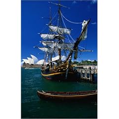 Poster 40 x 60 cm - "The replica of Captain William Bligh's sailing ship, "the Bounty", Sydney Harbour, with the Sydney O" von Juliet Coombe / Lonely Planet Images - auch in anderen Gr��en und als Leinwandbild erh�ltlich