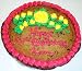 Chocolate Chip Cookie Cake 1lb. / 8" Pink Trim and Yellow Flowers