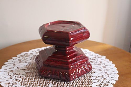 A beautiful hexagon shaped burgundy candleholder. The black and white crystals make this an eye catching piece.