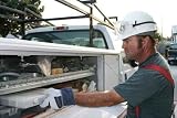 Electrician with Service Truck - 18W x 12H - Peel and Stick Wall Decal by Wallmonkeys