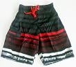 Mens Swim Trunks with Elastic Waist, 2 Side Inseam Pockets, Side Cargo Pocket. Faux Fly Front, Mesh lined. Black/Red Sizes S-XL