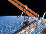 The Canadarm2 and Solar Array Panel Wings on the International Space Station, August 11, 2007 Photographic Poster Print by Stocktrek Images, 48x36