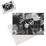 Photo Jigsaw Puzzle of Enthusiast photographs a vintage car from Mary Evans