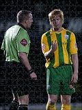 Photo Jigsaw 16x12 (40x30cm) McShane and the referee debate the number of fouls committed by West Bromwich Albion FC