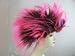 Pink and black spikey punk wig. Ideal for fancy dress parties.
