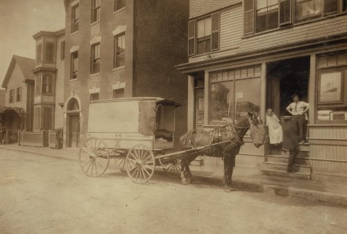 1912 child labor photo The wagon that delivers Home Work to Somerville, Mass. The owner of wagon (wh