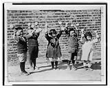 Historic Print (L): [Five Asian children holding up small barbells]