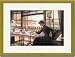 Gold Framed/Matted Print 17x23, Room with a glance from the port