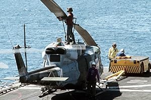 amphibious refueled helicopter assault iroquois tied uh 1n flight deck marine down amazon ship lha uss peleliu aboard 1989 coming