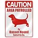 CAUTION  AREA PATROLLED BY BASSET HOUND SECURITY CO.  PARKING SIGN DOG