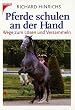 Pferde schulen an der Hand